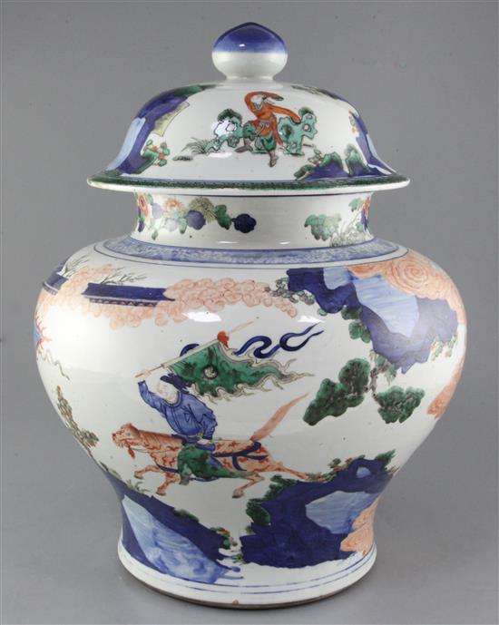 A massive Chinese wucai baluster jar and cover, early Kangxi period, c.1670, approx. height 50cm width 37cm, slight faults